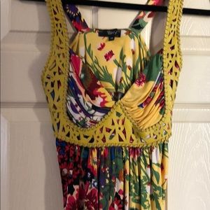 A silk tank floral print with yellow trim